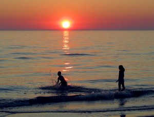 Kids playing along the shore of Lake Michigan. Photo credit: Rachel Kramer