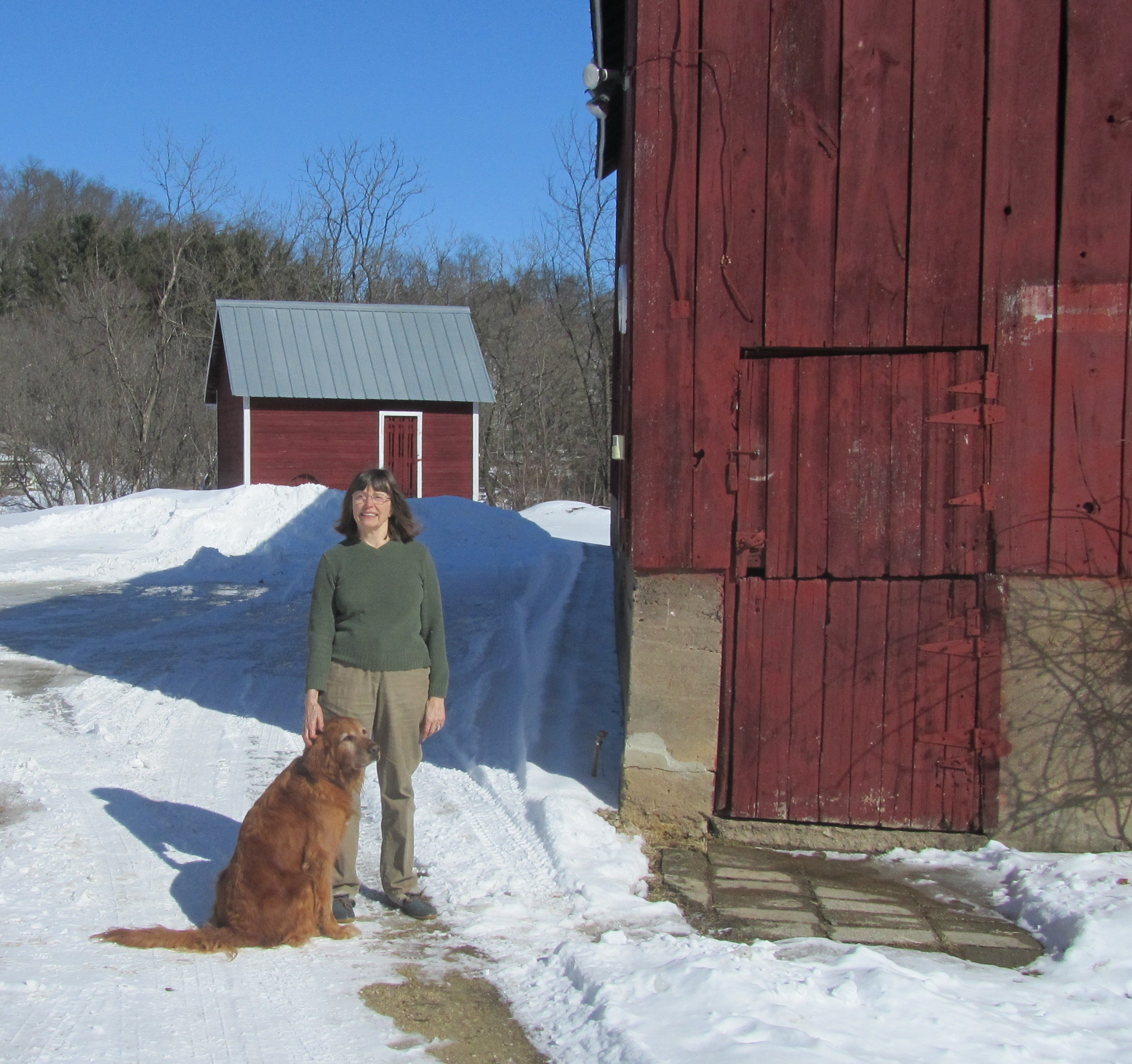 Sue and her dog at the farm. 